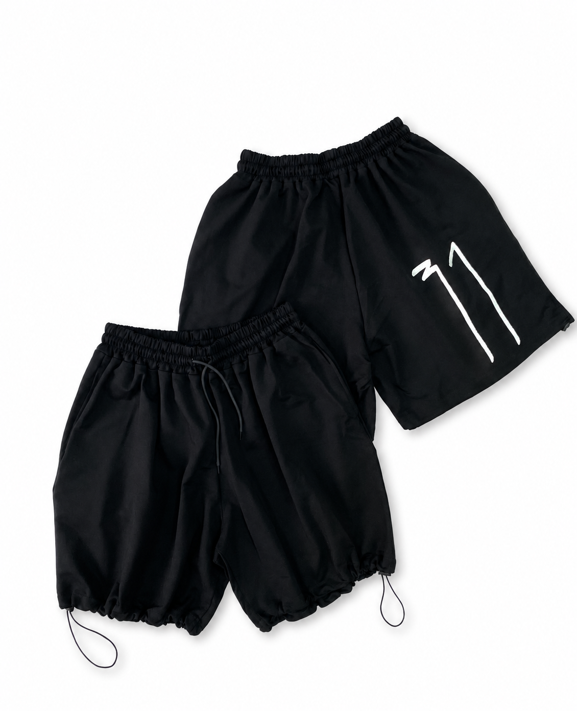 OKRUG 31 black relaxed shorts with elastic waistband, white 31 logo and adjustable hem drawcords