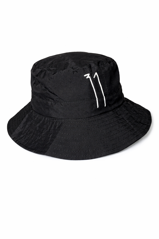 Black bucket hat with a white logo on a white background